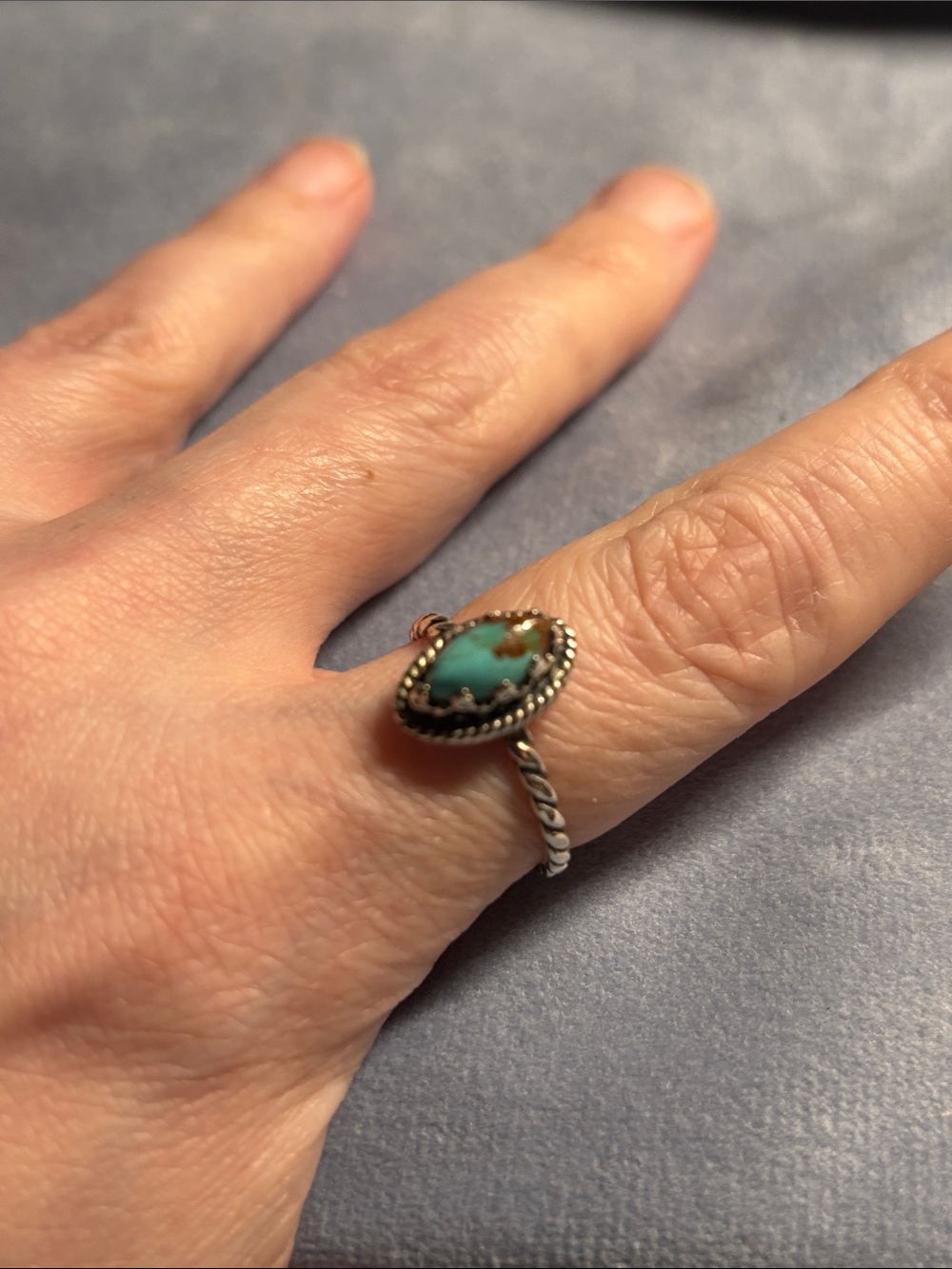 marquise-cut turquoise sterling ring twisted rope border around bezel setting